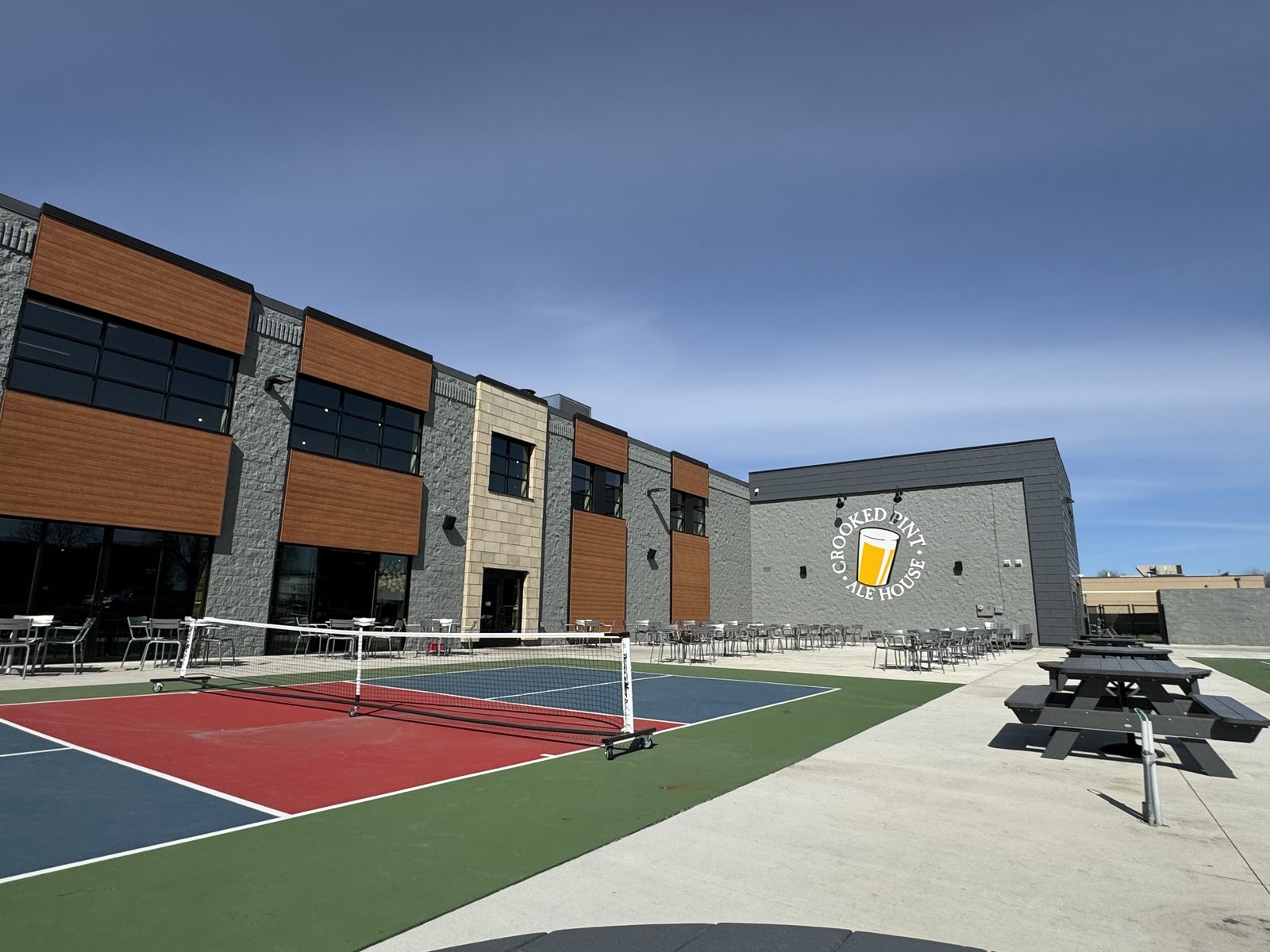The Pond on Madison building, with the pickleball courts out front
